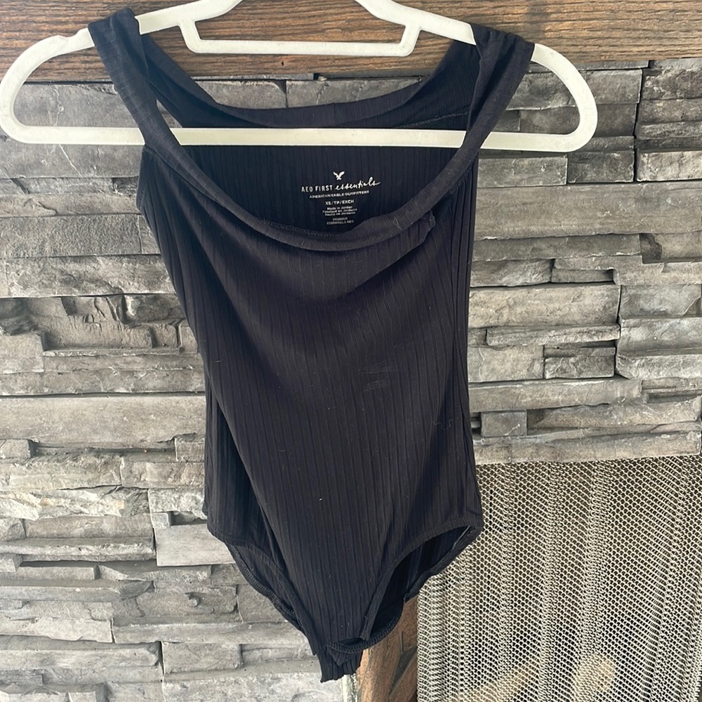 Black bodysuit.